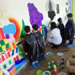 Progetto "Muro a colori": I bambini realizzano il murales del libro "NERO A COLORI"